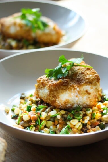 Cornmeal Crusted Fish ( or TOFU) with Fava Bean and Summer Succotash, and lime and cilantro - a delicious meal using fresh farmers market ingredients. | www.feastingathome.com