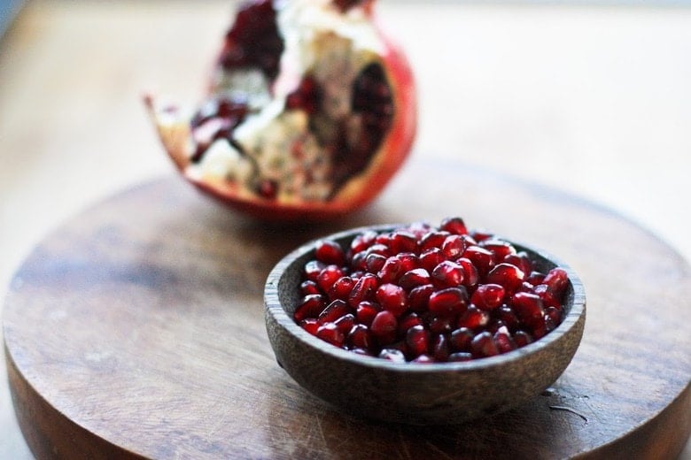 Pomegranate seeds in a bowl. 
