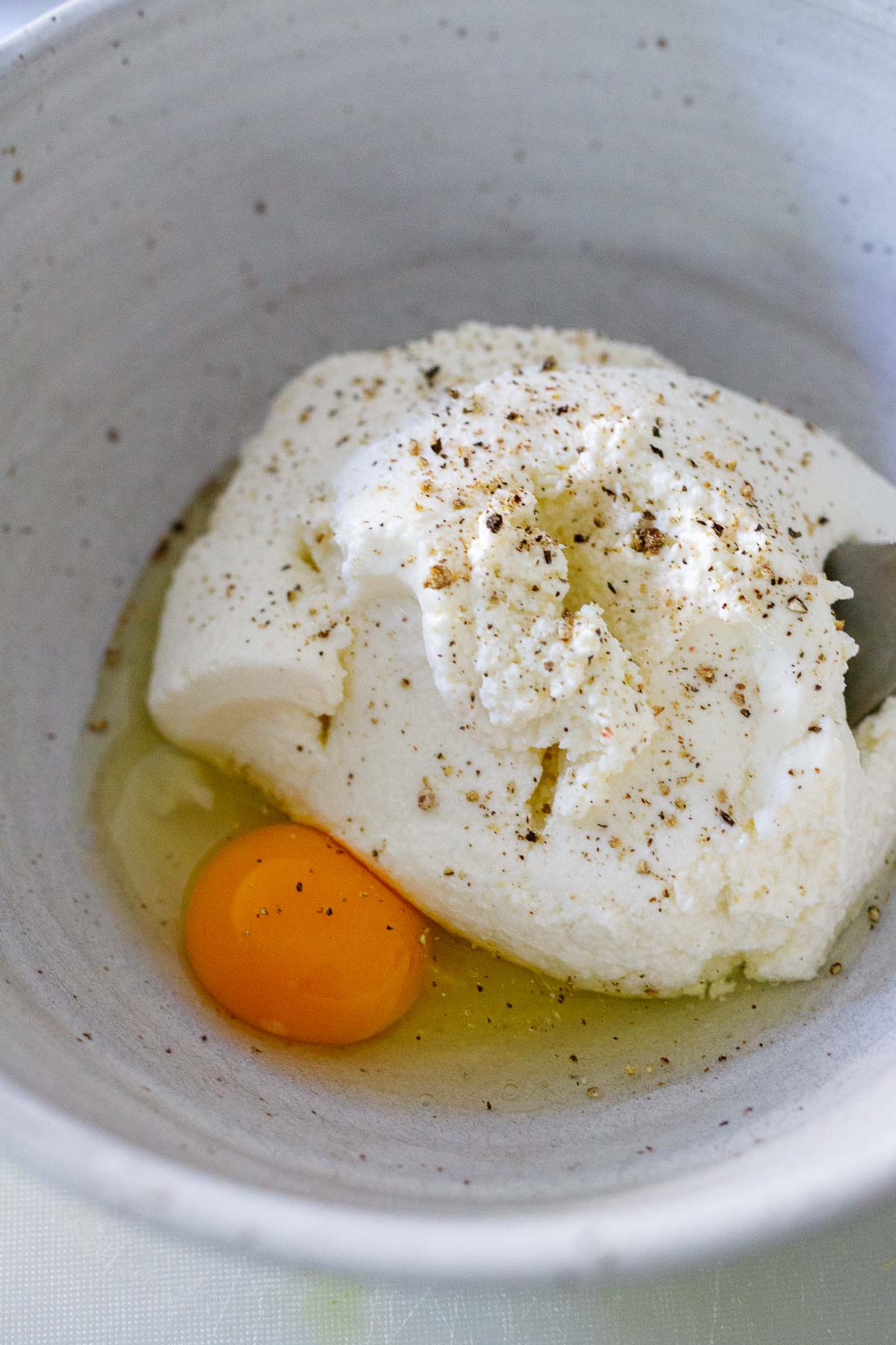 ricotta mixture with the egg, pepper and nutmeg.