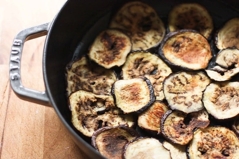 An authentic, delicious recipe for Rustic Eggplant Moussaka- perfect for entertaining or serving at a special gathering. Can be made ahead and baked prior to serving. #moussaka #eggplant #eggplantmoussaka #lamb #vegetarianmoussaka