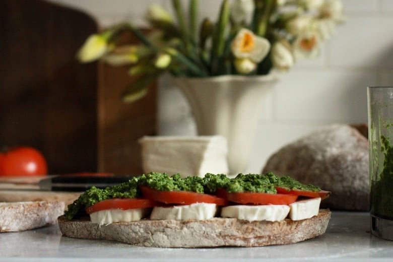 Grilled Caprese Sandwich with Arugula Pesto- a toasty, melty grilled cheese sandwich with flavorful arugula pesto. #grilledcheese #grilledcheesesandwich #arugulapesto #arugula