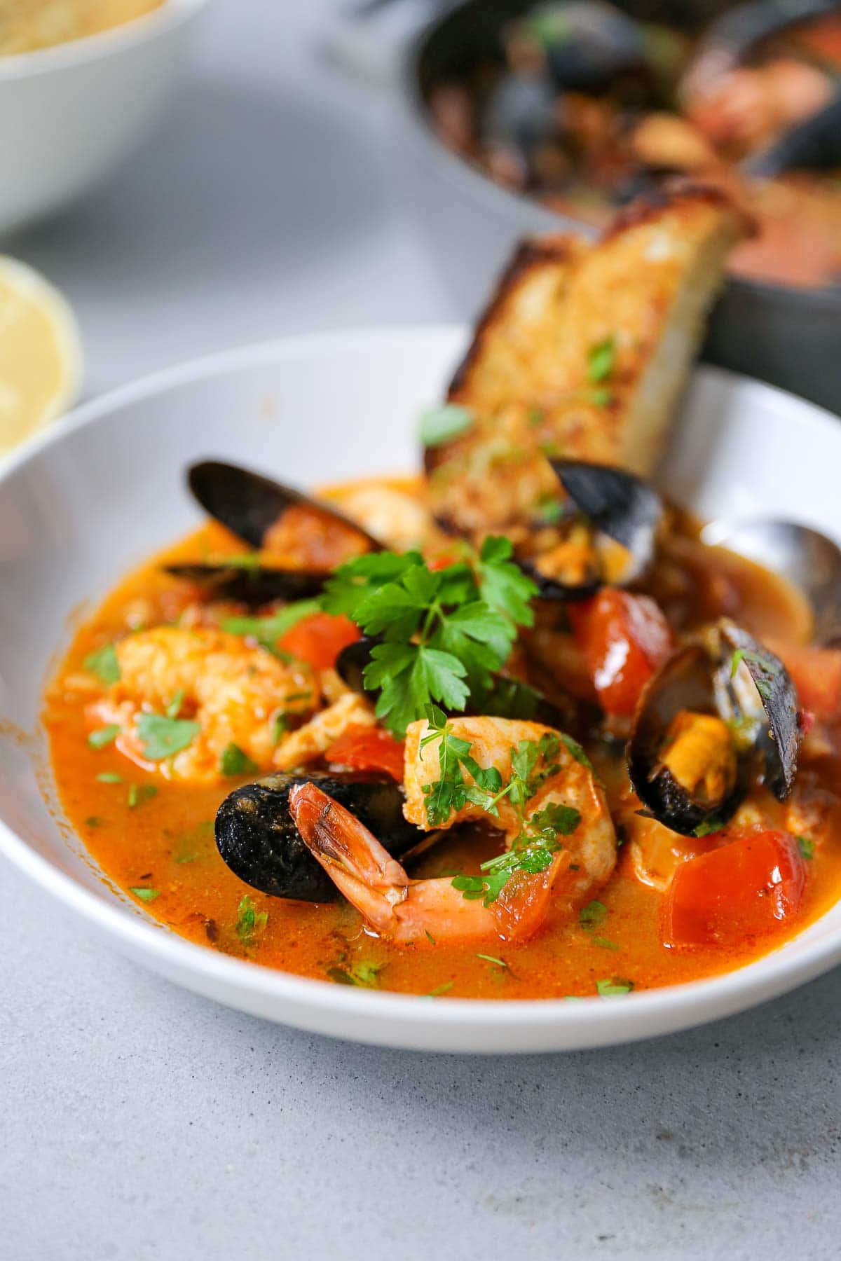Seafood stew with tomato-fennel broth with fresh fish and seafood and optional chorizo.