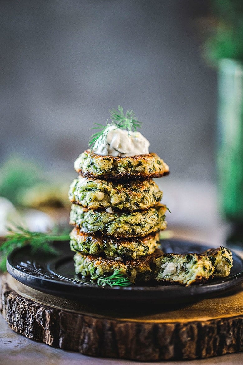 Best Zucchini Recipes 20 Best Zucchini Recipes: Zucchini Fritters with dill, feta and Tzatziki Sauce, a simple easy way to use up summer squash and zucchini! Healthy and light! #zucchinifritters #zucchinicakes #zucchinirecipes