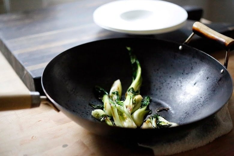 stir frying the bok choy.