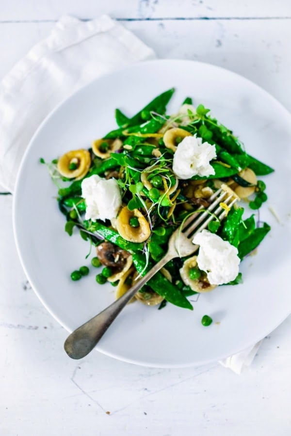 30 Vibrant Healthy Spring Recipes : Orecchiette Pasta with fresh peas, asparagus and herbs in a very light carbonara sauce.