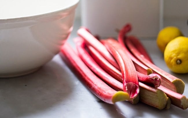 Upside Down Rhubarb Cake that is gluten free- made with Almond Flour. Deliciously addictive, perfect for Spring. | www.feastingathome.com #rhubarb #rhubardcake #upsidedowncake #rhubarbtart #glutenfreecake