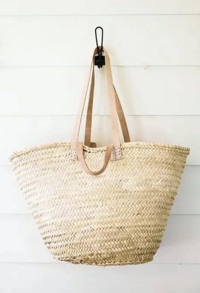 French straw market bag with leather straps at Bowl and Pitcher Store.