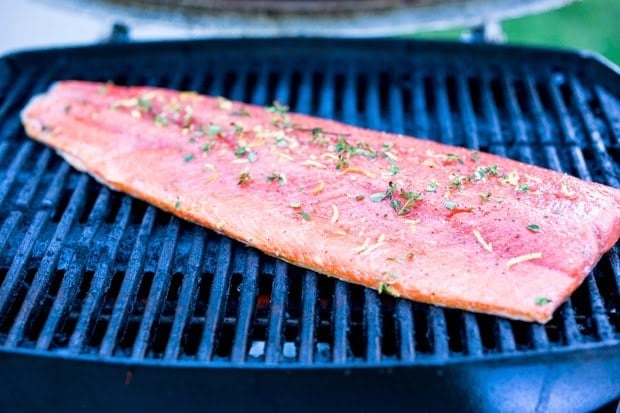 1 ½- 2 lb Fillet of Wild Salmon ( skin on) olive oil for brushing and salt and pepper ½ C apple wood chips ( optional) thyme lemon zest and juice Huckleberry Relish 1 ½ C fresh huckleberries ½ C sugar ( or honey) ½ C red wine vinegar ¼ teaspoon salt 1 tsp whole coriander seeds (optional) 1 large shallot- finely minced Serve over a few handful of greens (arugula, baby kale, watercress) with Everyday Quinoa .