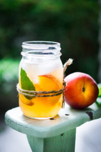 Simple Refreshing Peach Sangria Recipe ...a delicious summer drink made with white wine and Elder flower liquor (or syrup) that can be made ahead. Perfect for a crowd!