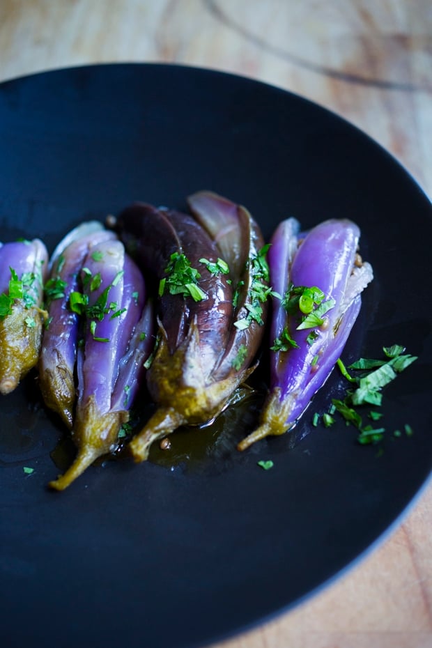 Moroccan pickled eggplant with garlic, coriander and cilantro. Drizzled with olive oil they make the perfect addition to any meal. | www.feastingathome.com.com