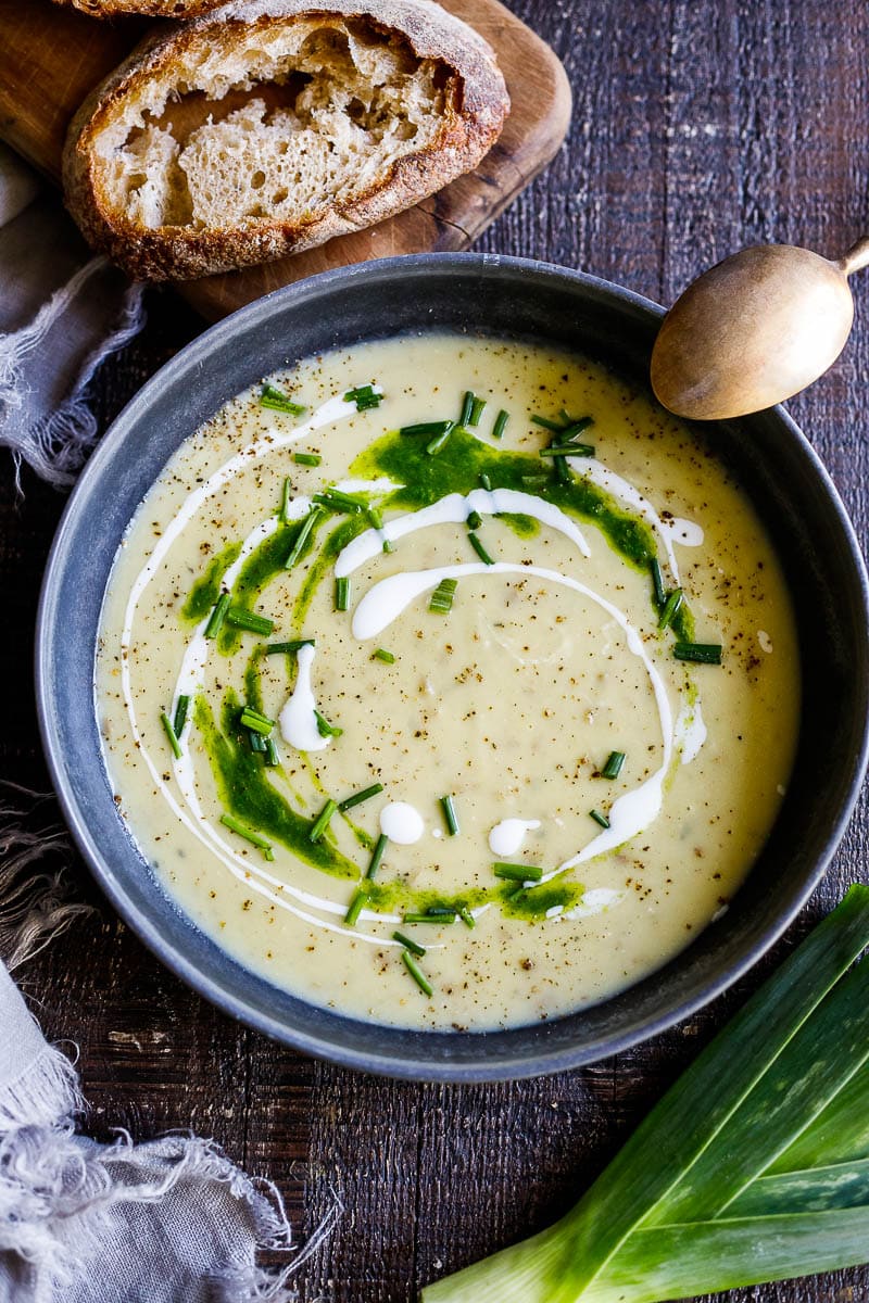 This simple healthy recipe for Potato Leek Soup is deceiving flavorful. A nourishing, soul-satisfying meal in under 30 minutes, made with simple ingredients. Vegan adaptable. With a video!