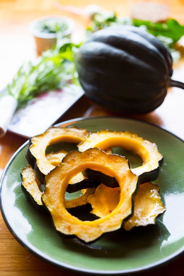 sliced and roasted rings of acorn squash seasoned with oil, salt, pepper, and cayenne. 