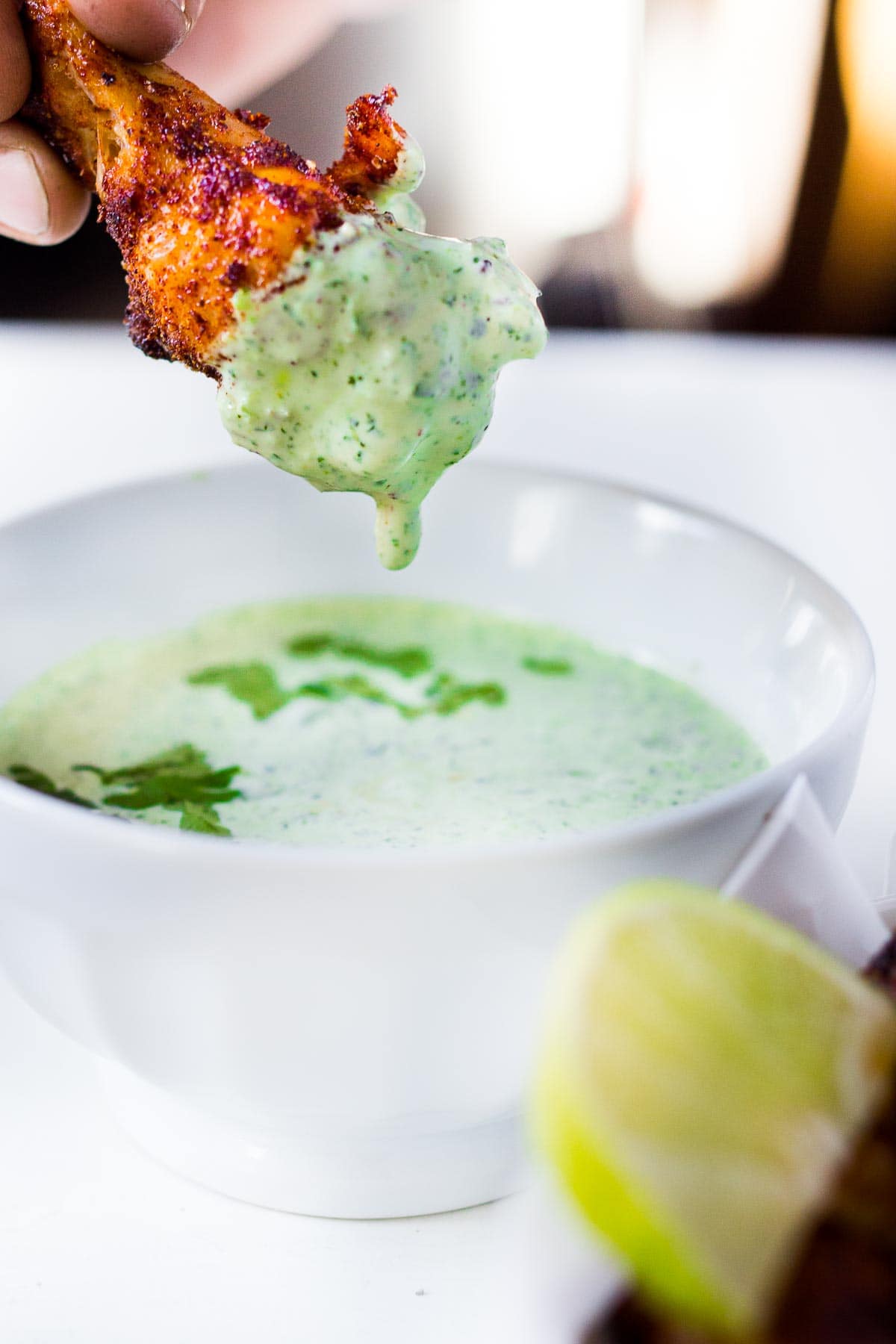 Baked Chicken Wings with a Smoky Chipotle Rub & Creamy Cilantro Dipping Sauce. A fast and healthy approach to chicken wings, packed full of deep smoky flavor! Easy and simple!