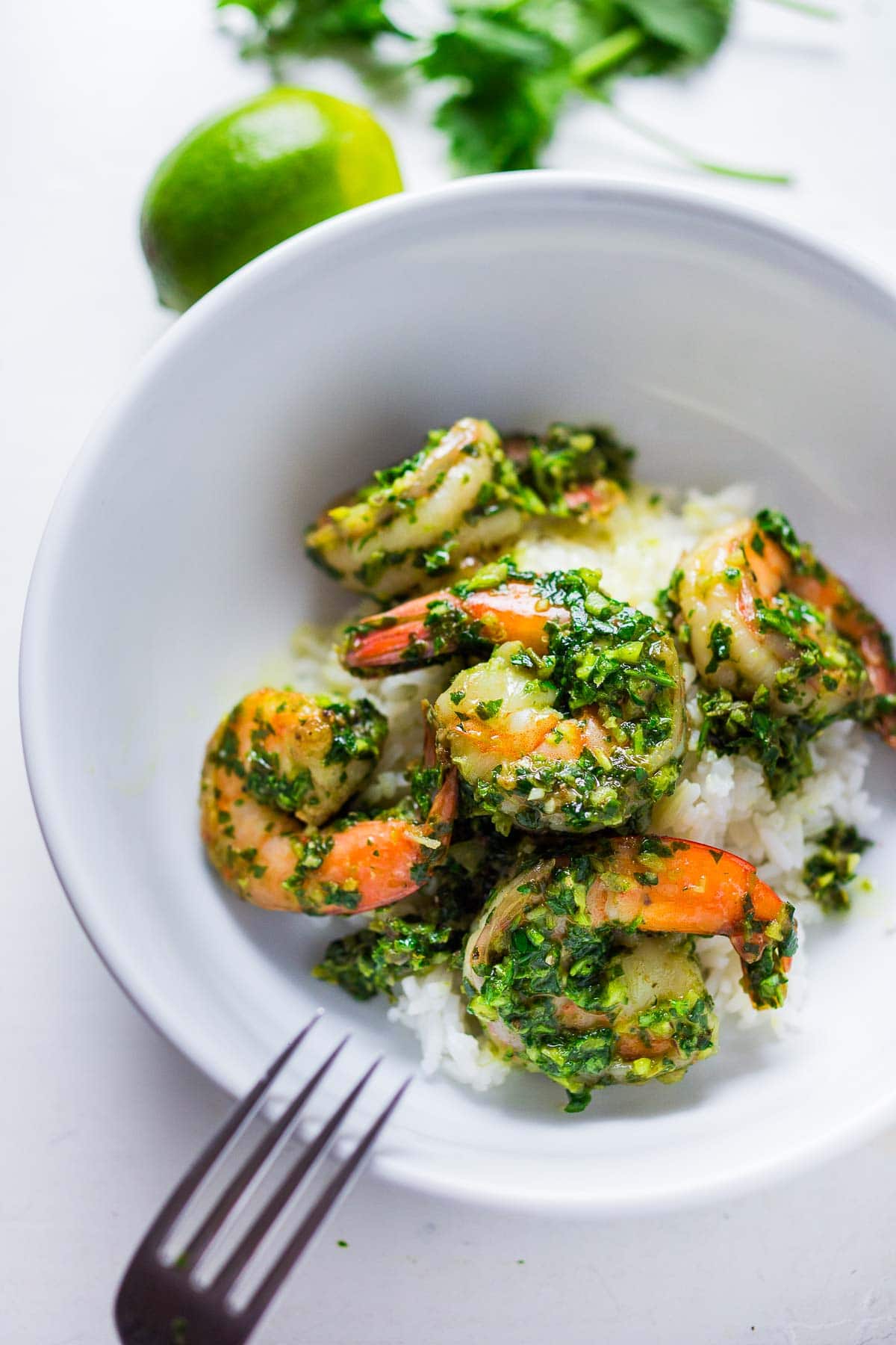 chimichurri shrimp in a bowl of rice.