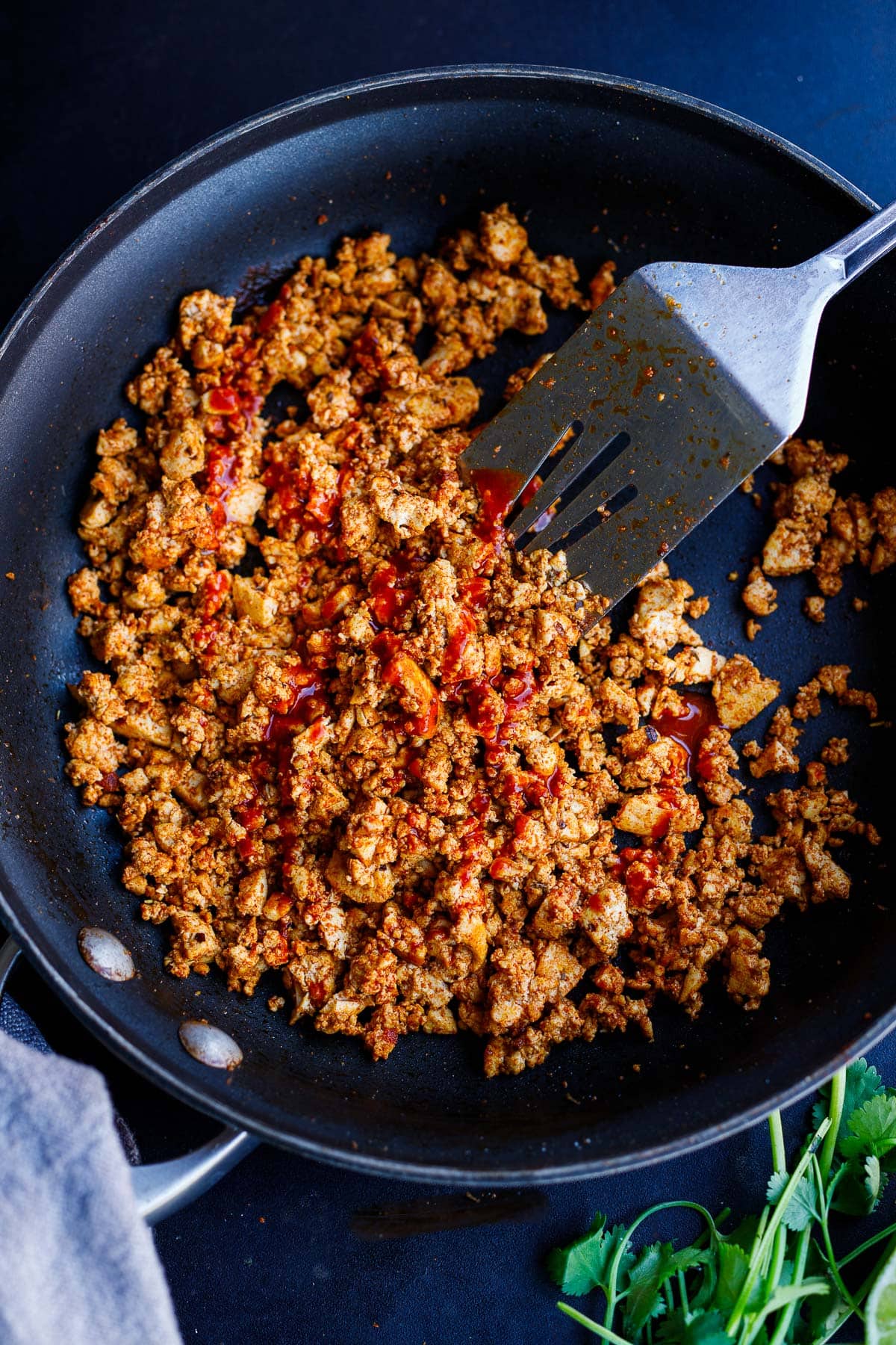 a skillet full of sofritas for burrito bowls.