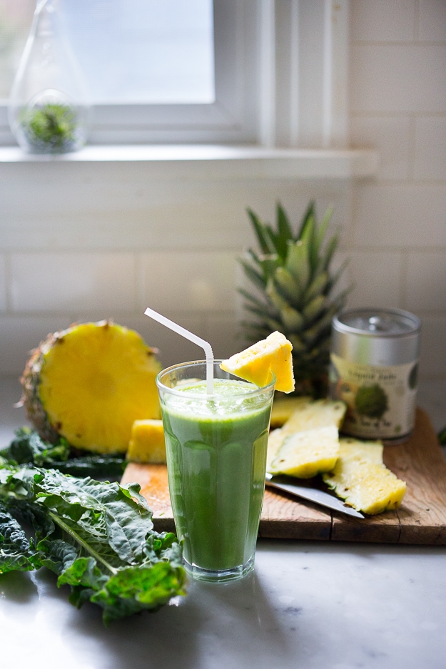 Matcha Pineapple Smoothie with Kale- An instant mood lifter and energizing drink full of healthy antioxidants! | www.feastingathome.com This Matcha Smoothie with pineapple, banana, and spinach is delcious, healthy, and energizing, full of incredible health benefits!
