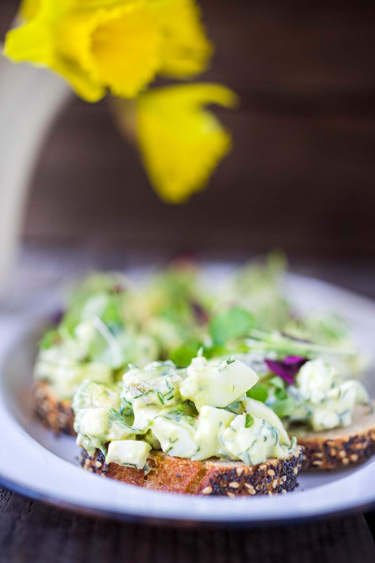Egg salad appetizer, served on bruschetta. 