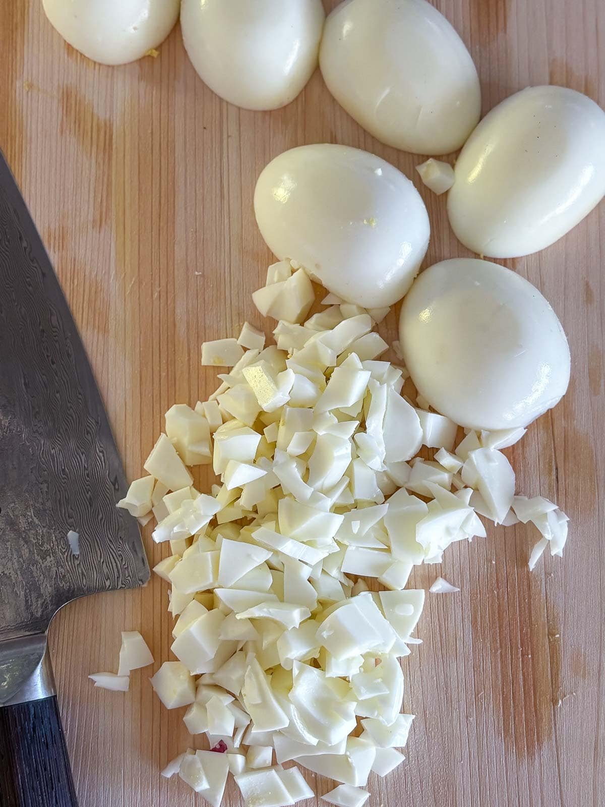 Chopping the egg whites. 