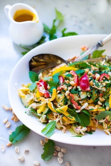 Thai Vegetable Crunch Salad with a light peanut ginger dressing- vegan and gluten free| www.feastingathome.com