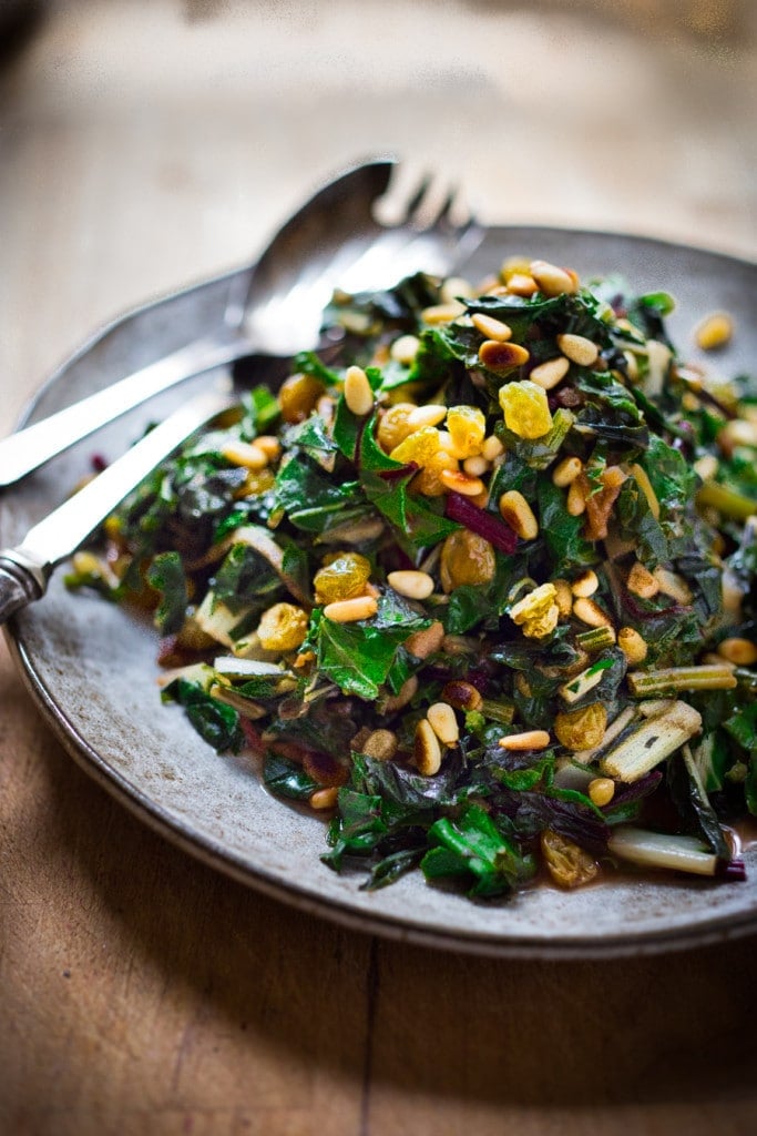 Catalan-Style, Sauteed Spinach with garlic, golden raisins, and pine nuts, a simple, flavorful side dish that can be made in 25 minutes. 
