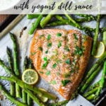 Oven Baked Salmon with Asparagus and Yogurt Dill Sauce - an EASY healthy, sheet-pan dinner that comes together in under 30 minutes. #salmon #roastedsalmon #bakedsalmon #aspargus #dinner #sheetpandinner #easyrecipes #healthy #keto #lowcarb