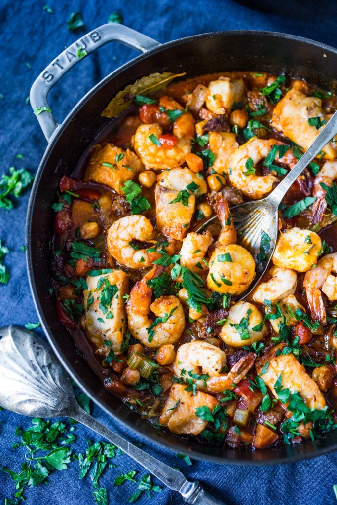 Spanish seafood stew in a braiser.