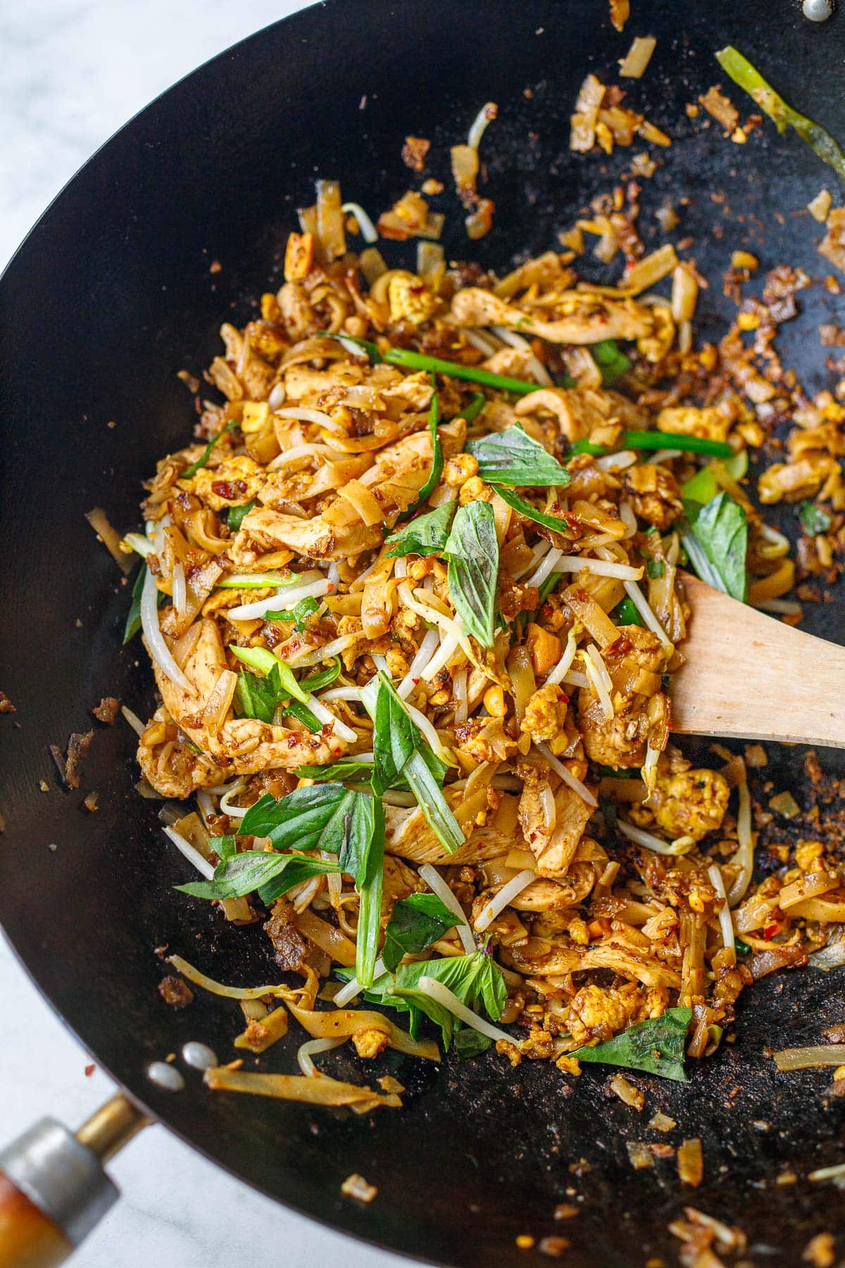 Fast easy Pad Thai in a wok. 