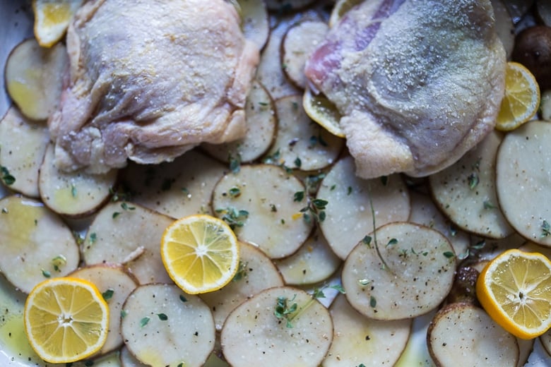 prepping chicken thighs for baking. 