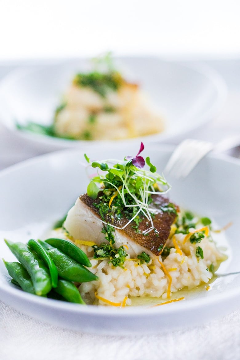 A simple delicious recipe for Seared Black Cod (or halibut, sea bass or scallops) served atop a lightened up Meyer Lemon Risotto drizzled with Gremolata. A perfect date-night dinner!