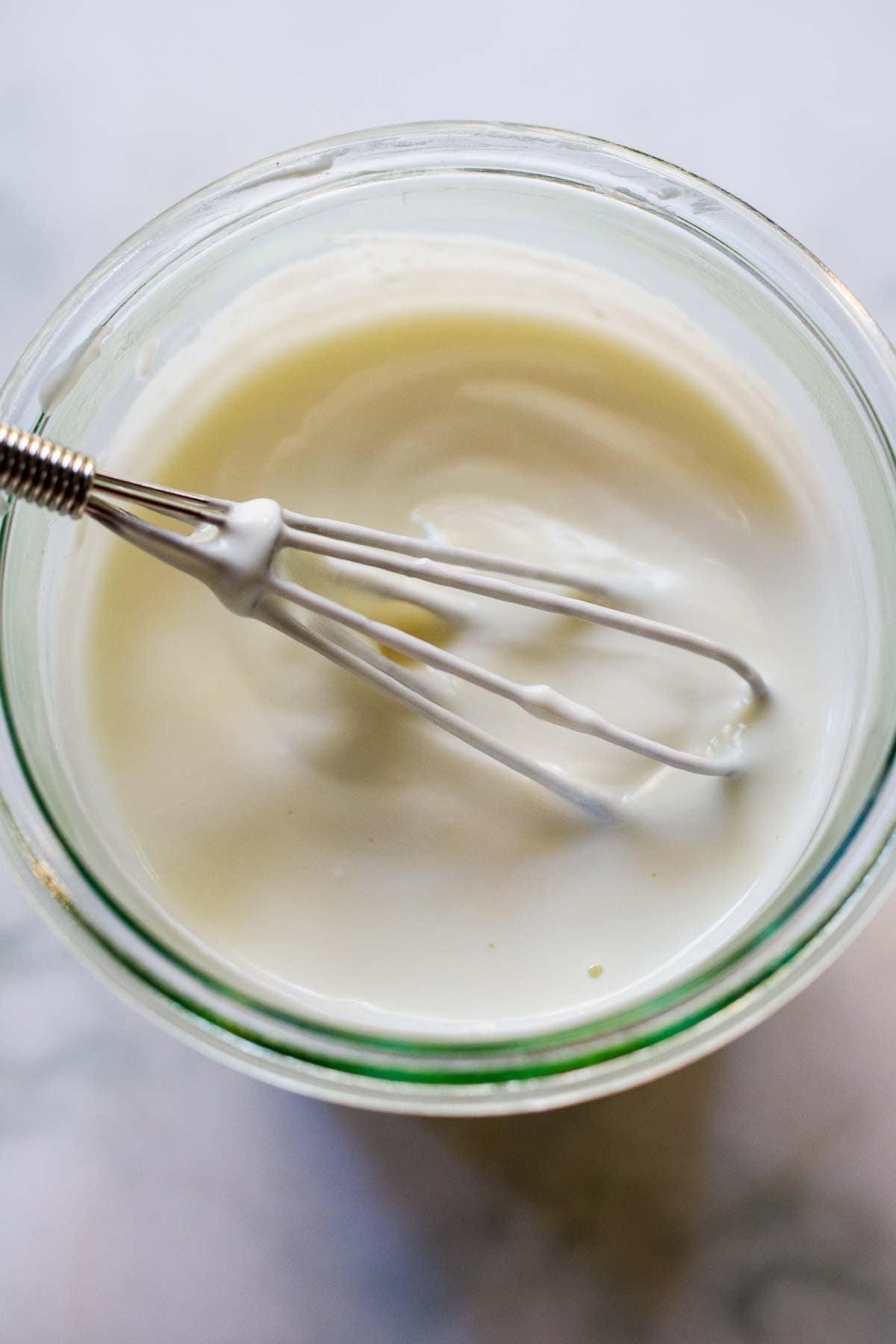 whiskinig the yogurt.