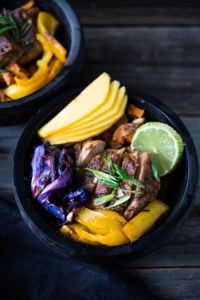 Caribbean-Style, Island Bowls- with roasted cabbage, sweet potatoes and your choice of tofu (or chicken), baked in the most flavorful Caribbean-style marinade ever! Serve over a bed of seasoned black beans with fresh juicy mango and lime juice! Yum!