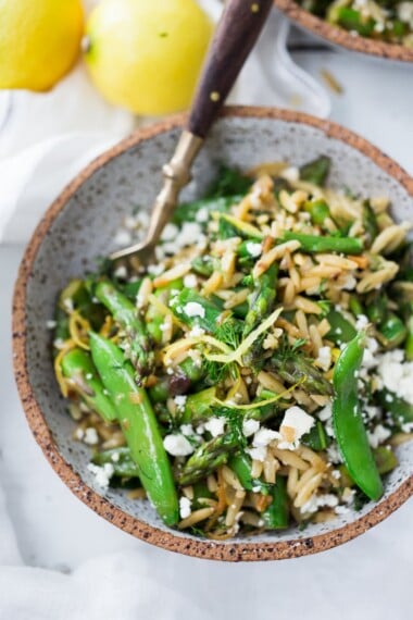 Spring Orzo Pasta with Asparagus, Lemon and Dill- serve this warm as quick flavorful entree or chilled as a side salad. | www.feastingathome.com