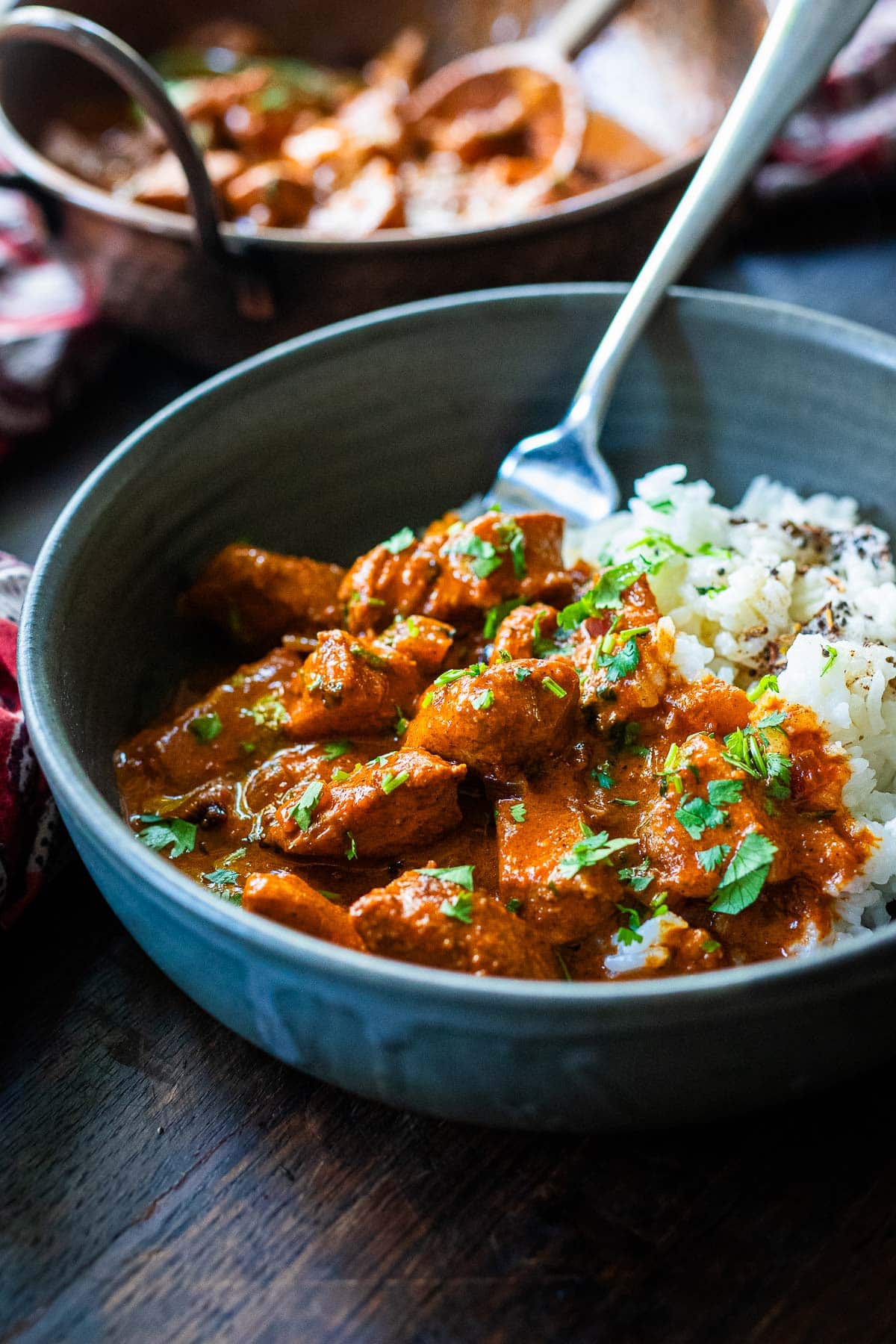 The best recipe for Butter Chicken, (Chicken Makhani) a classic Indian dish made with tender chicken breast in a fragrant spiced tomato curry sauce enriched with ghee. Vegan-adaptable and GF.