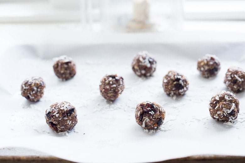Coconut Pecan Energy Balls on a sheet pan. 