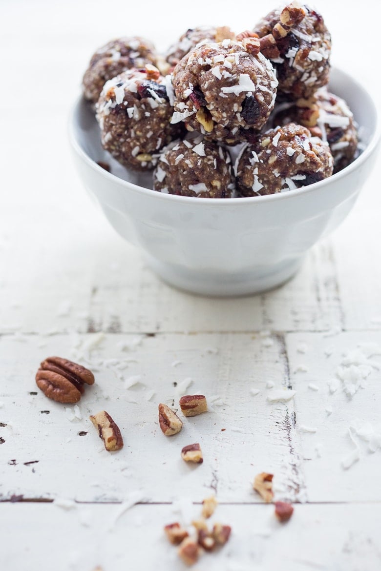 These Energy Balls are easy and delcious! Made with dates, coconut, pecans and a hint of garam masala spice, they are a tasty vegan and gluten-free snack that can be made in 10 minutes! 