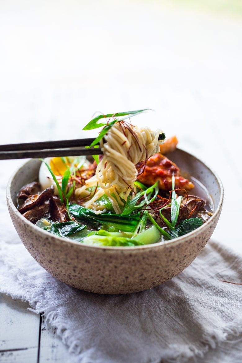Simple Spicy Miso Ramen w/ Roasted Chili Salmon ( or tofu!) with bok choy, mushrooms and scallions. Vegan and Paleo adaptable! Swap out zucchini noodles or kelp noodles to keep it Paleo! Make in 20 minutes! | www.feastingathome.com