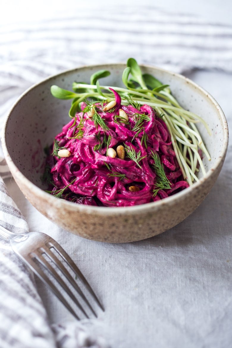 Wondering what to do with spiralized beets? Here's a simple beet noodles recipe you'll fall in love with! It's cozy and comforting and easy to make with simple ingredients! Vegan-adaptable and gluten-free. 