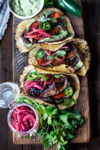Sheet-Pan, Chipotle Portobello Tacos - smoky, spicy and "meaty" - these VEGAN tacos are sure to satisfy even the most diehard meat-lovers! Make them in 30 minutes! | www.feastingathome.com #vegantacos #portobellotacos