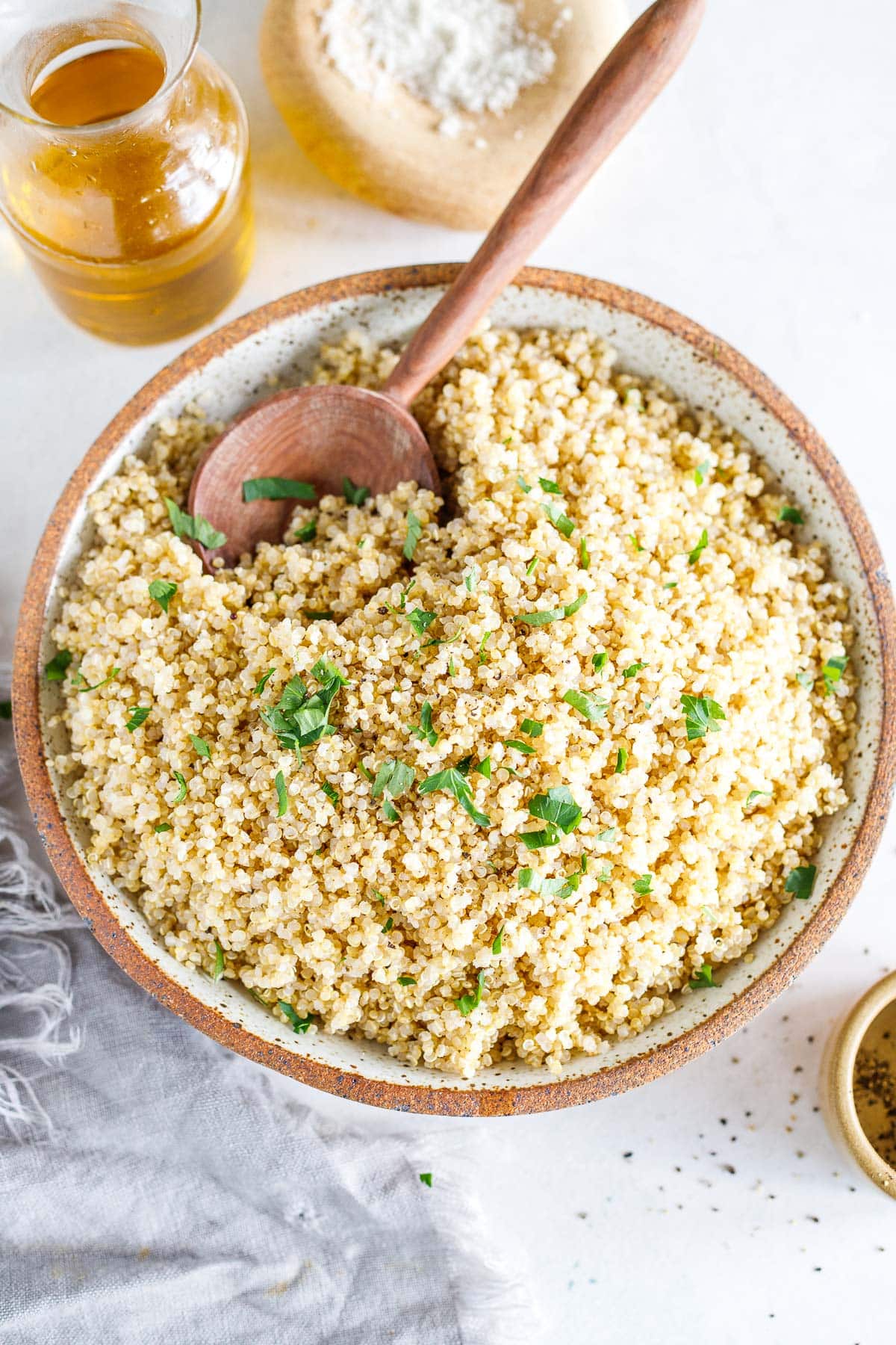 Learn how to cook perfect fluffy quinoa every time! Use in bowls, salads, wraps, or make our herby quinoa side dish. Vegan & gluten-free.