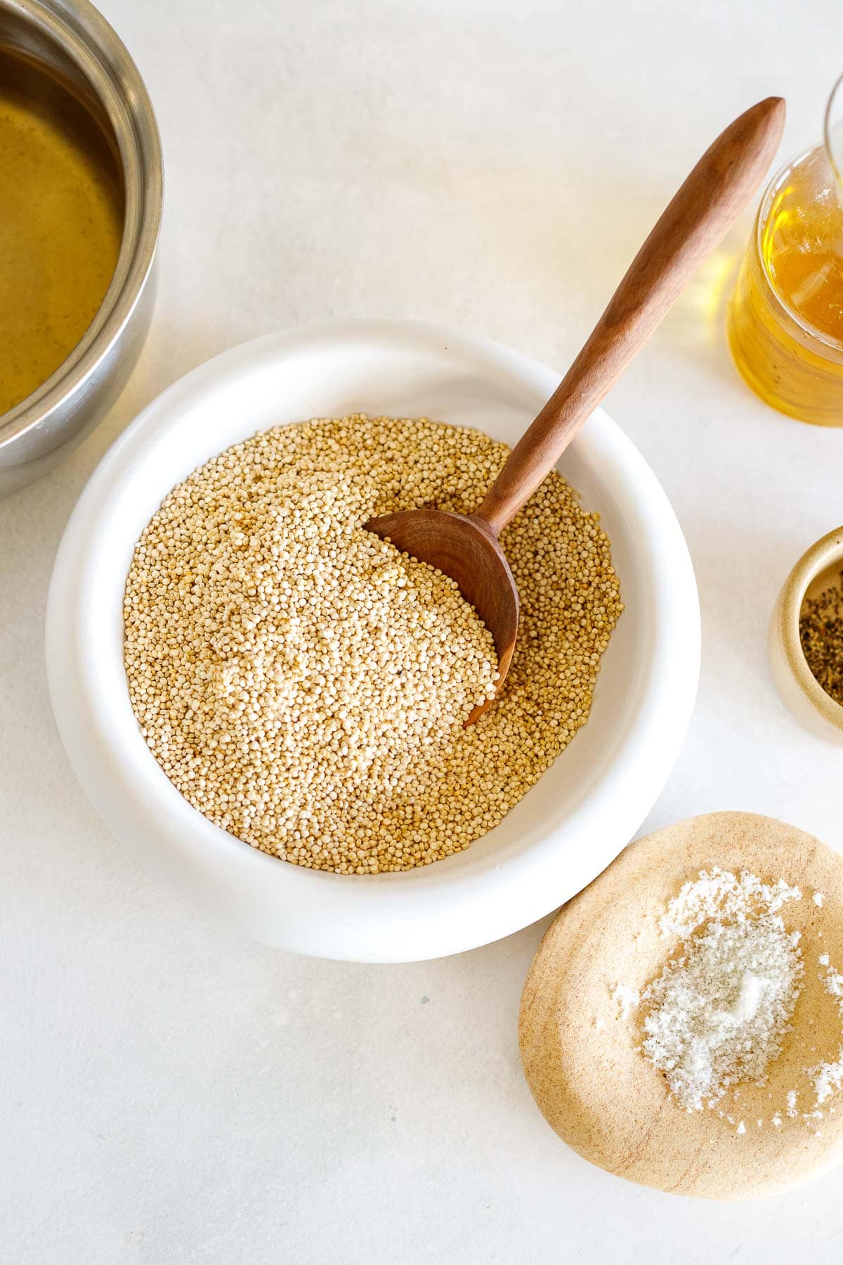 Ingredients in fluffy quinoa- white quinoa salt, broth and olive oil.