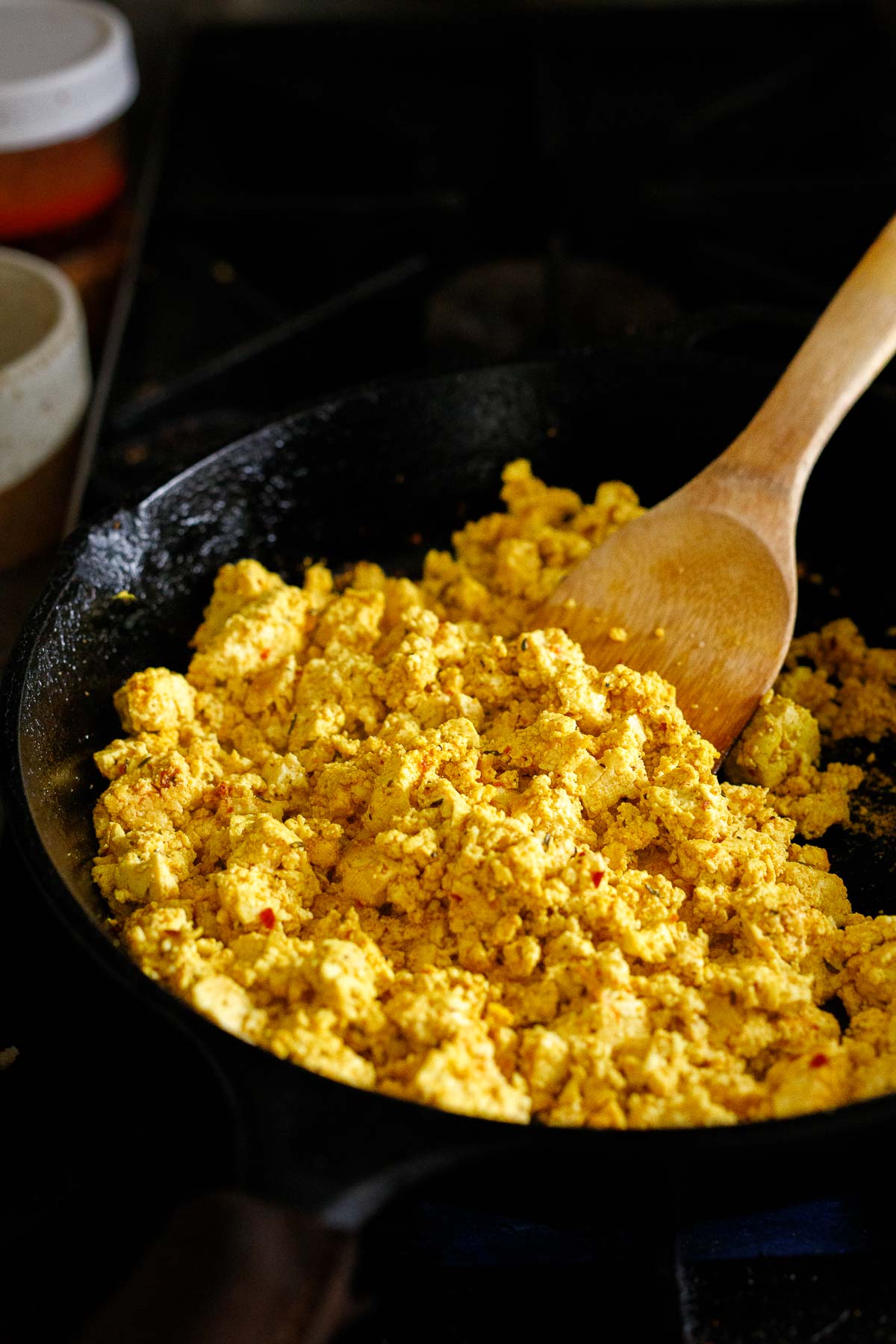 Stirring the tofu scramble.
