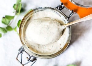 A delicious recipe for Creamy Vegan Ranch Dressing that can be made without oil! Low calorie & made with silken tofu. Dairy-free, Nut-free, Gluten-Free and ZERO Cholesterol! Perfect for salads, wraps, bowls or as a veggie dip! #veganranch #nooil #nut-free #vegan #ranch