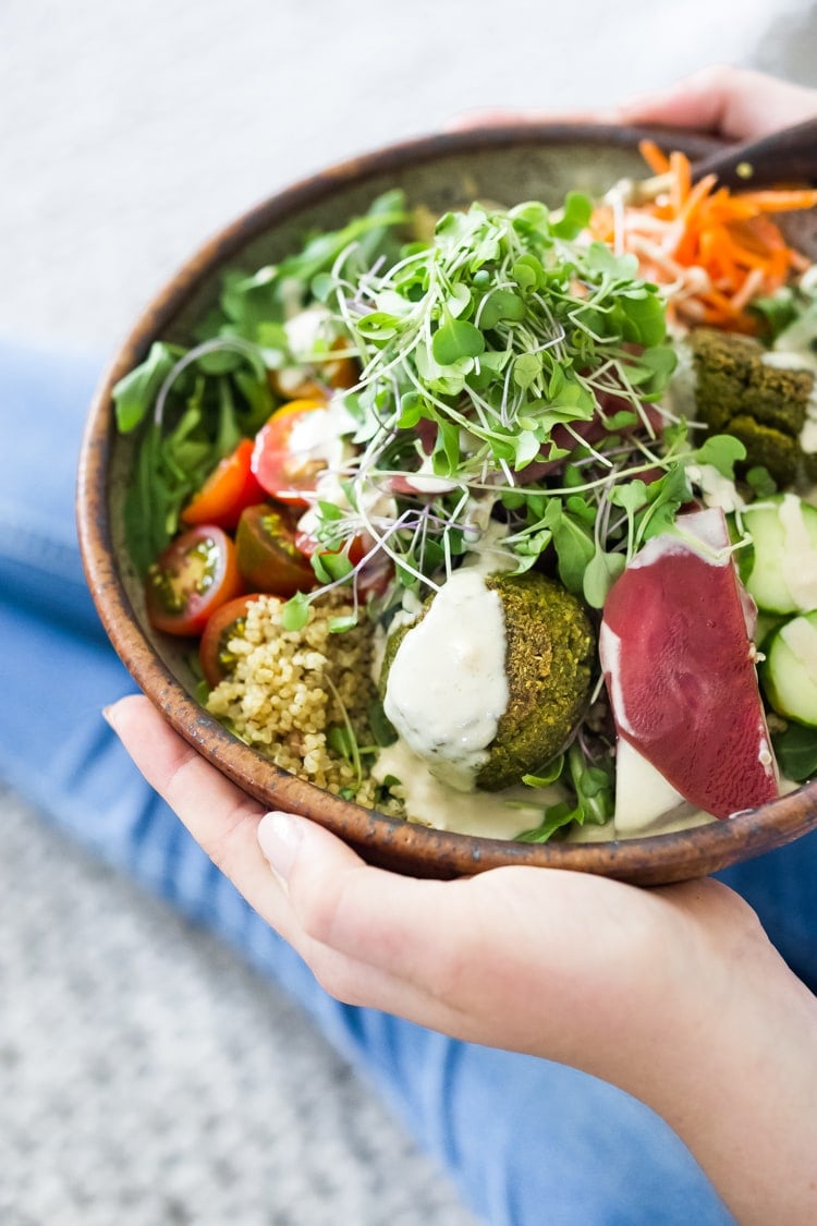 20 Vegan Buddha Bowls Our 25 BEST Vegan Buddha Bowls!| Like this...Baked Falafel Bowl! Meal-prep these authentic falafels and freeze for the busy workweek. Serve with warm grains or grains, fresh or roasted veggies and tahini sauce! Vegan and Gluten-free! #buddhabowl #veganbowl #veganbowls #buddhabowls #falafelbowl #easyfalafel #bakedfalafels #bakedfalafel #falafelsalad #cleaneating #eatclean #plantbased #detox