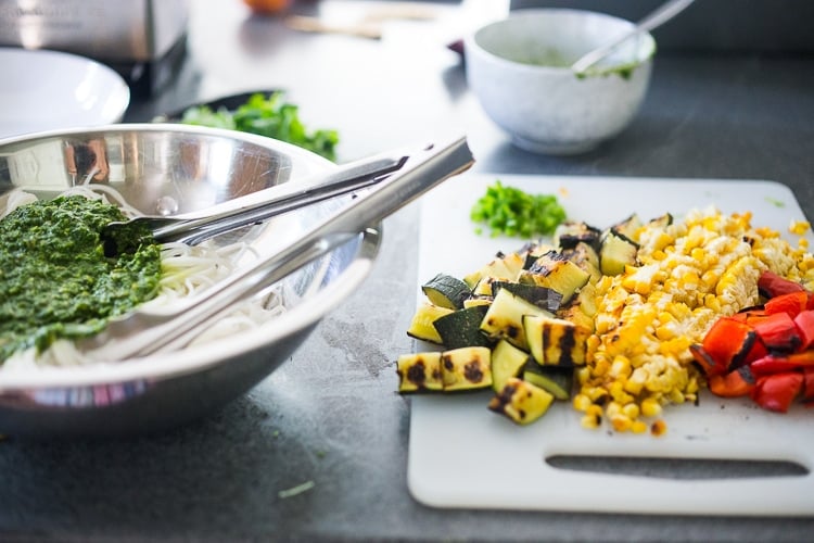 assembling the pasta salad.