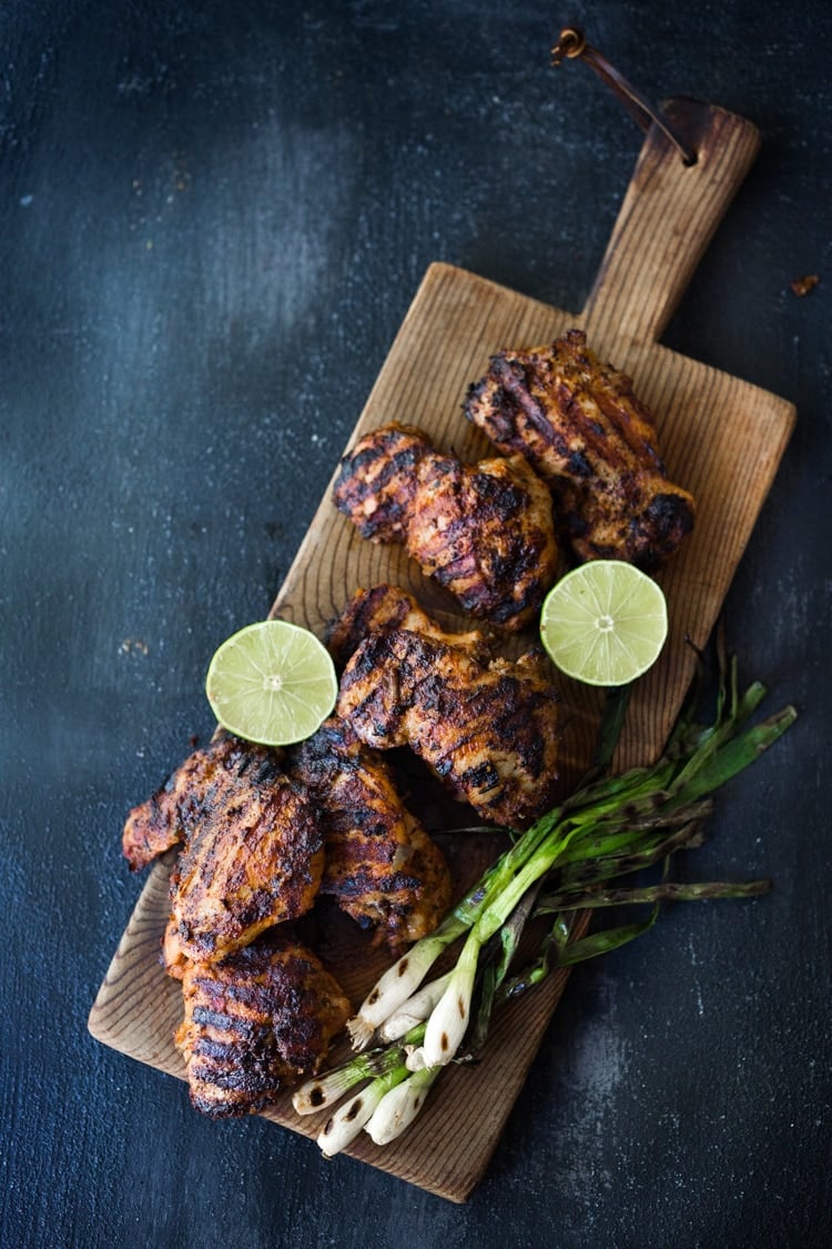 Smoky, spicy and delicious, this Grilled Chipotle Chicken is bathed in the most flavorful marinade. Grill the chipotle chicken ahead and reheat on busy weeknights, or store it in the flavorful chipotle marinade, then fire up the grill after work. Use in burrito bowls, salads, tacos, or pasta. So EASY and oh so tasty! #chipotlechicken #grilledchicken #chicken #chipotle #grilled 