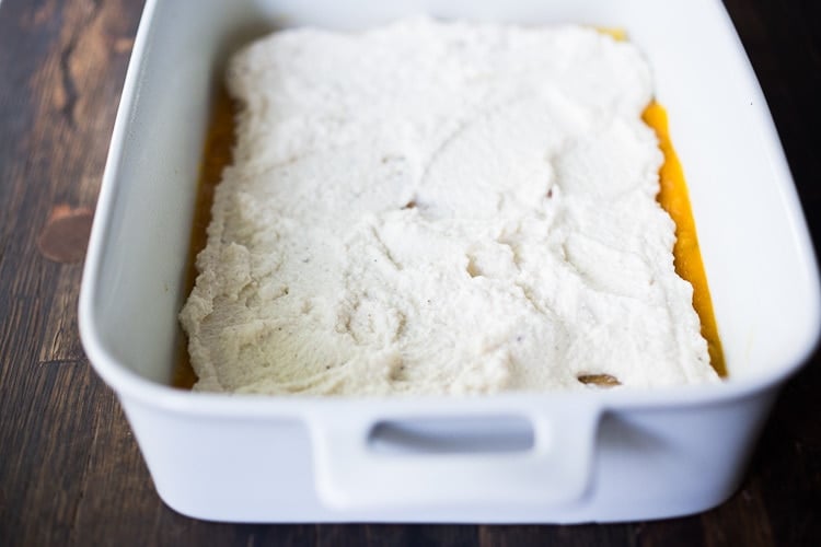 Ricotta cheese being spread.