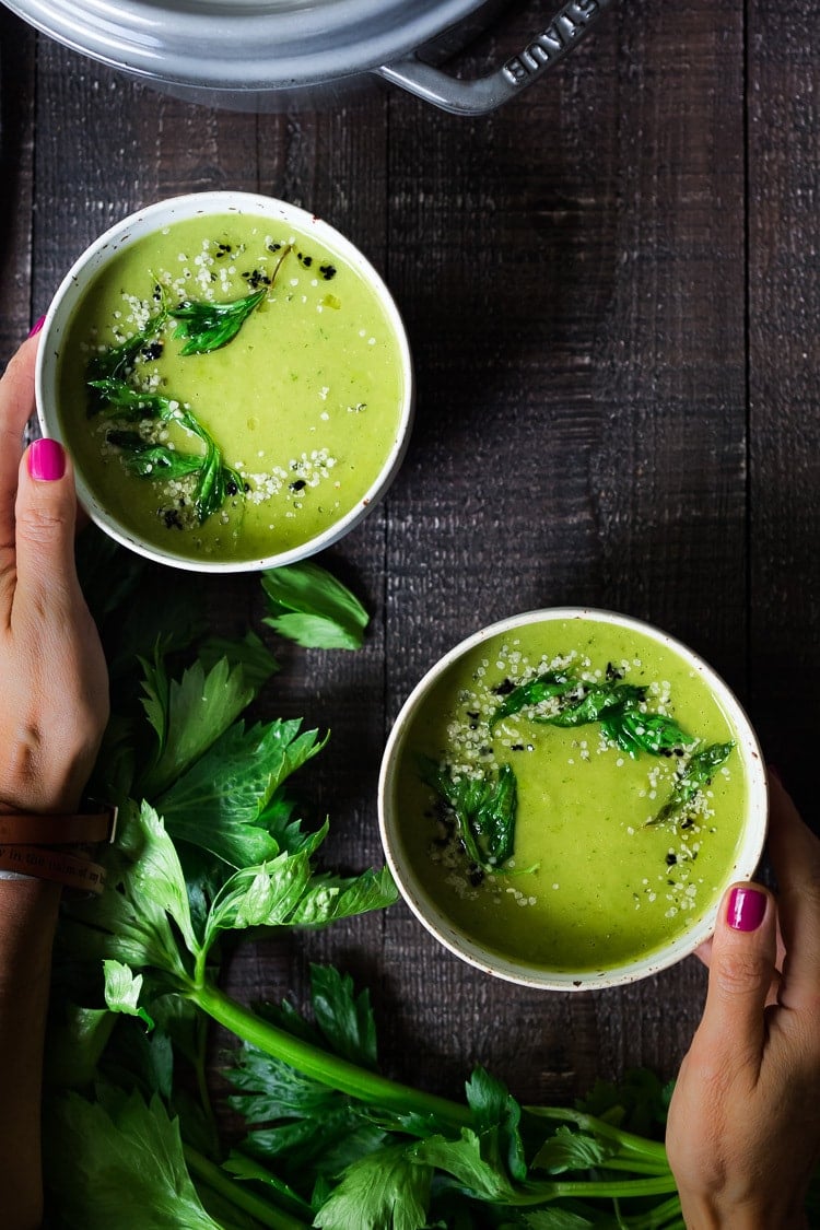 A healing bowl of Celery Soup- comforting, affordable and flavorful, that can be made in 35 minutes. Healthy, delicious and vegan adaptable! #celerysoup #celerysoup #vegan #vegansoup #healthysoup