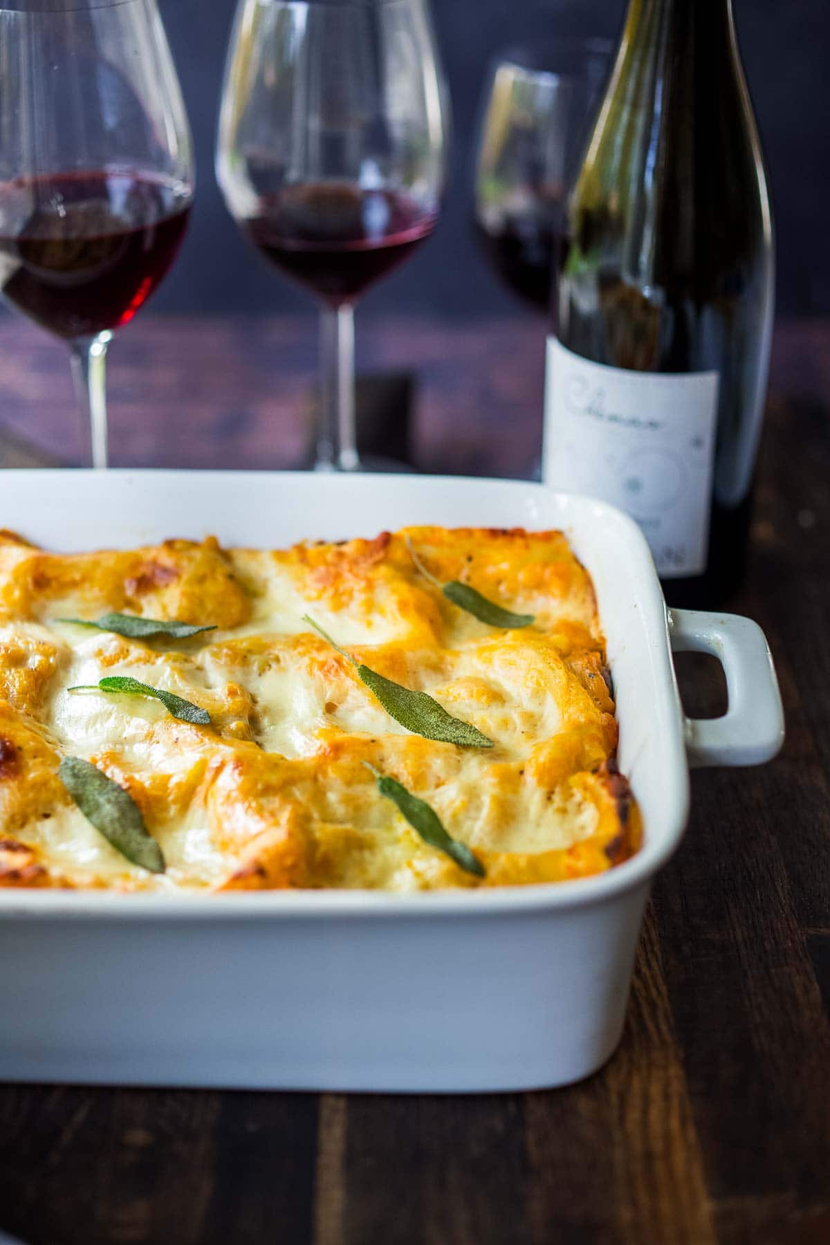 This Butternut Squash Lasagna recipe is a cozy and heartwarming vegetarian meal, made with a creamy roasted butternut squash sauce, no-boil noodles, mushrooms, spinach, ricotta, and crispy sage. Video + Vegan-adaptable.