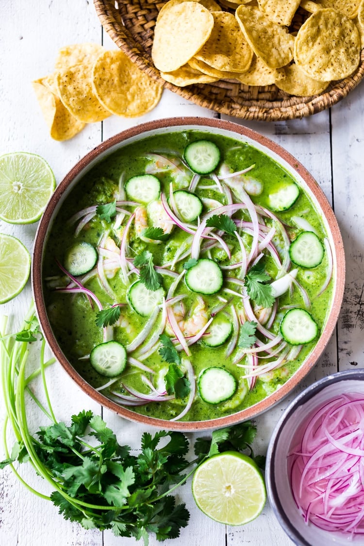 Authentic Aguachile Recipe! Similar to ceviche, shrimp is cooked in a mixture of lime juice, chiles and cilantro. Flavorful, simple and sooooo delicious! #aguachile #shrimp #verde #ceviche #Mexican