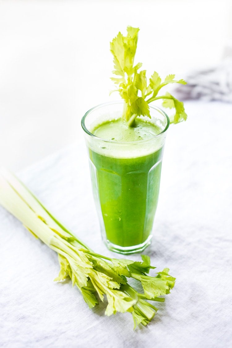 Celery juice in a tall glass.